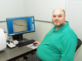 UGA Skidaway Institute researcher Jay Brandes with the Raman microscope.