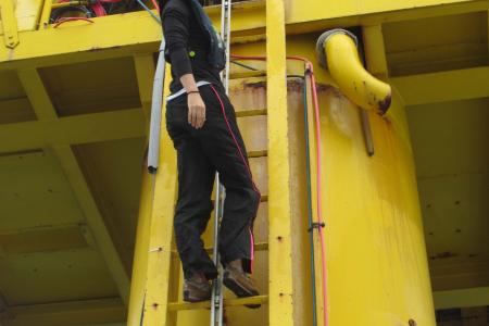 meg climbing ladder at icbm station