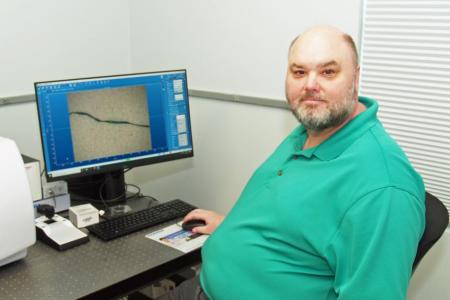 UGA Skidaway Institute researcher Jay Brandes with the Raman microscope.