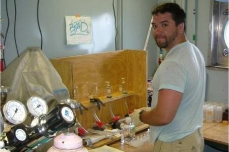 Brad working in the lab on a cruise